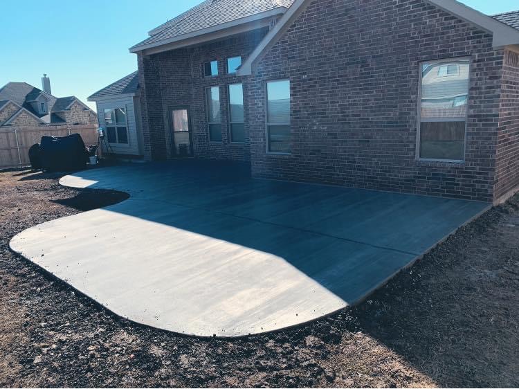 Decorative stained concrete patio with curved design